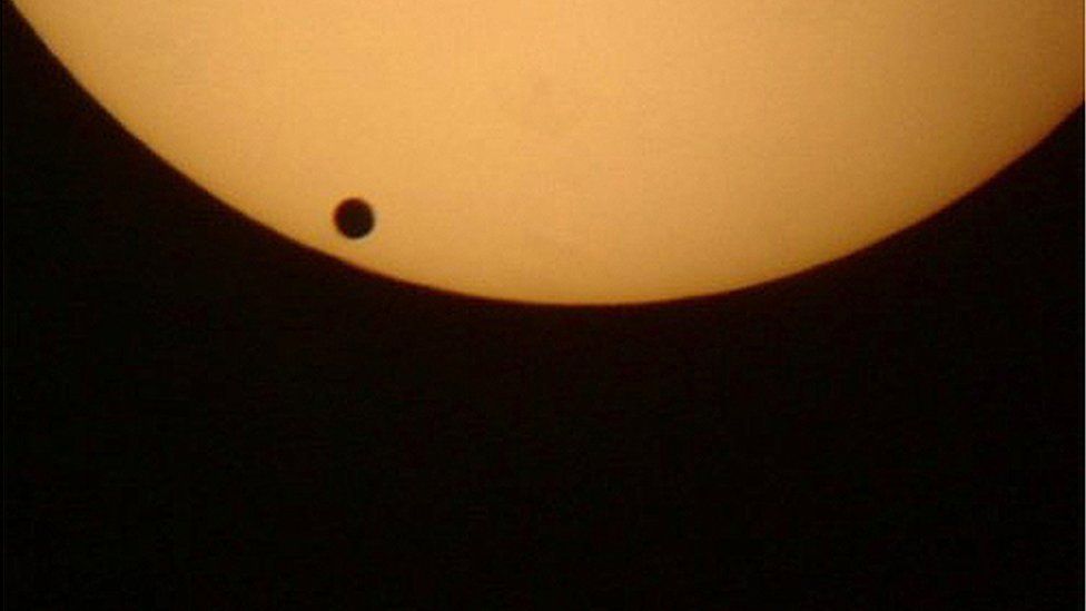 Venus as a black spot on the sun