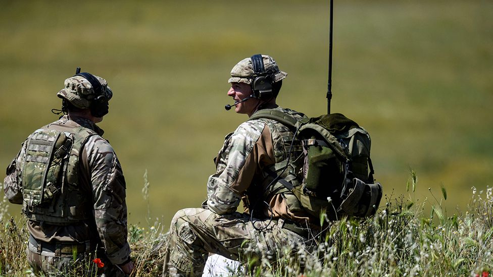 British soldiers take part in the Swift Response 22 military exercise at the Krivolak Military Training Center in Negotino, in the centre of North Macedonia, on May 12, 2022.