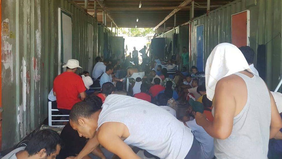 Refugees in Australia's former detention centre on Manus Island