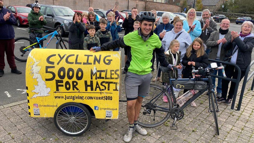 Josh Garman finishing his found-Britain cycle ride