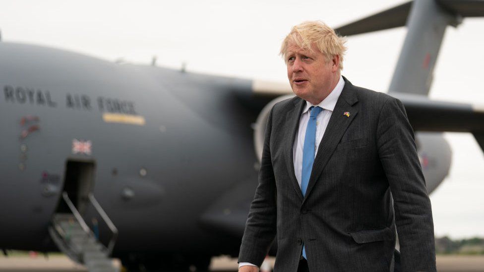 Image shows Boris Johnson at RAF base