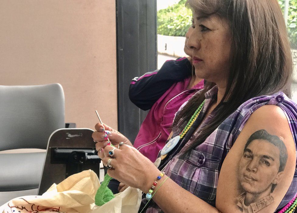 Beatriz Méndez with a tattoo of her son visible on her shoulder
