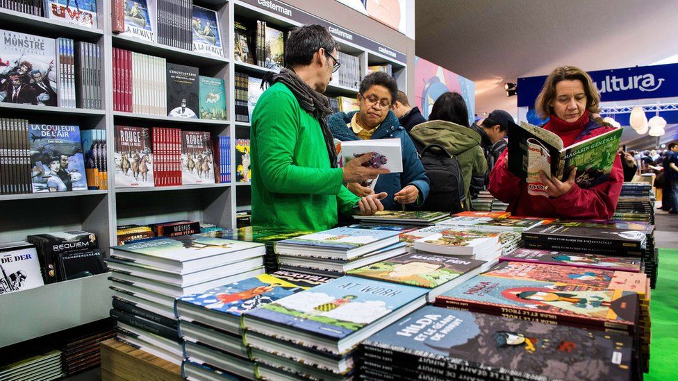 Visitors attend the 42nd Angouleme International Comics Festival (Festival international de la bande dessinee d'Angouleme) on Friday 30, 2015 in Angouleme, central France