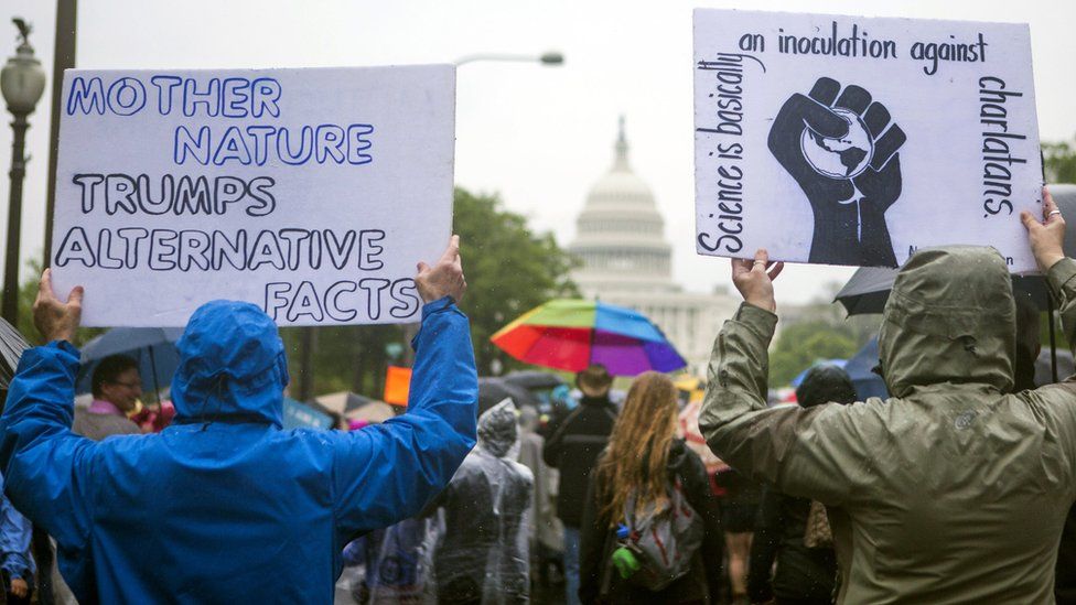 Scientists and supporters participate in a March for Science in Washington DC, 22 April 2017