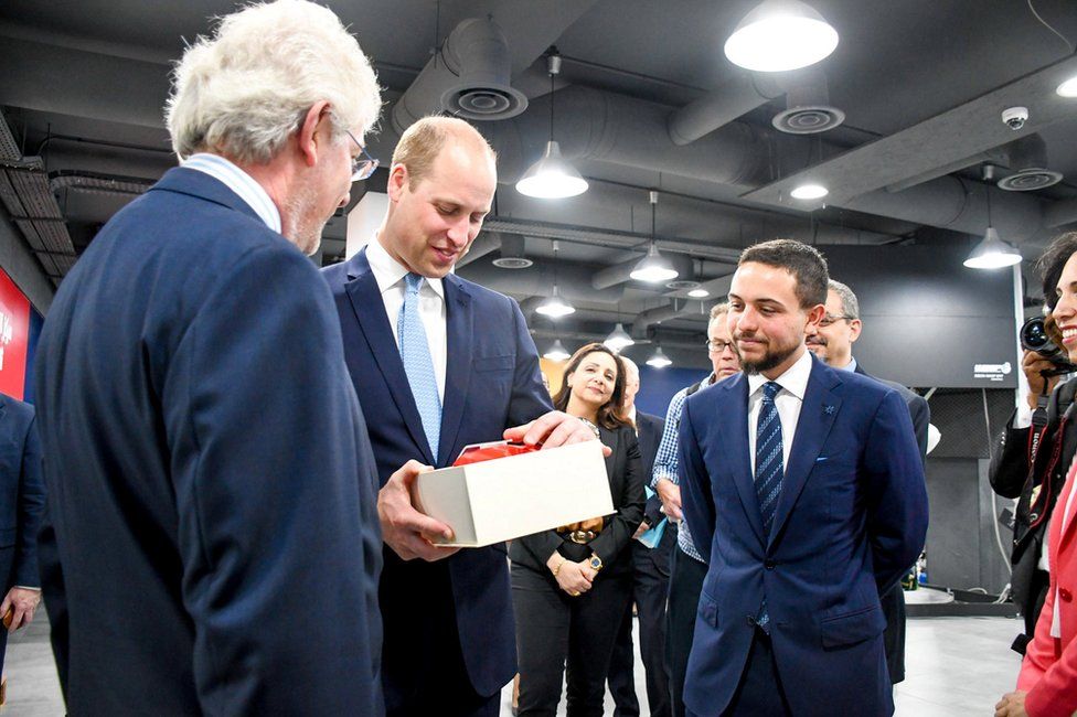 Prince William and Jordan's Crown Prince Hussein during their visit to the Crown Prince Foundation in Amman, Jordan.