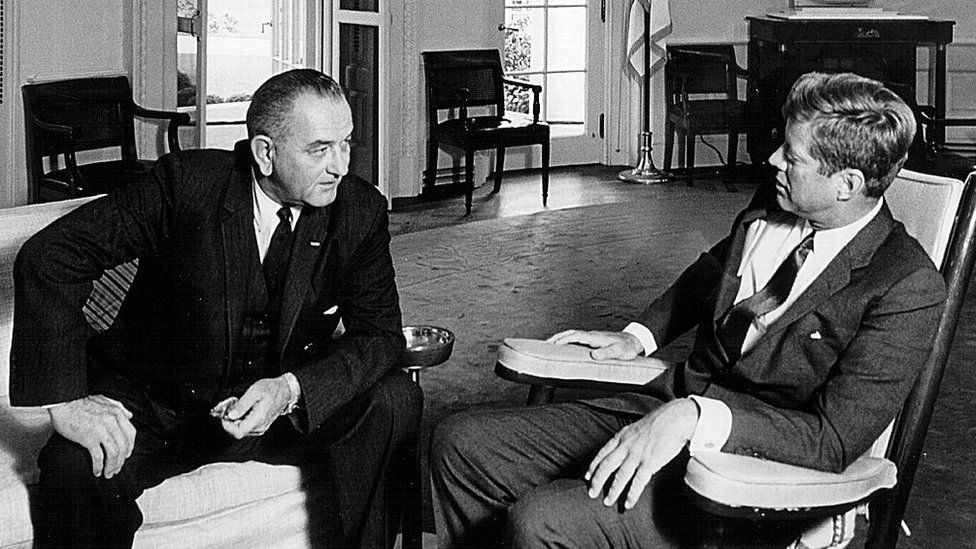 John F Kennedy, right, meets with Lyndon B Johnson in the Oval Office