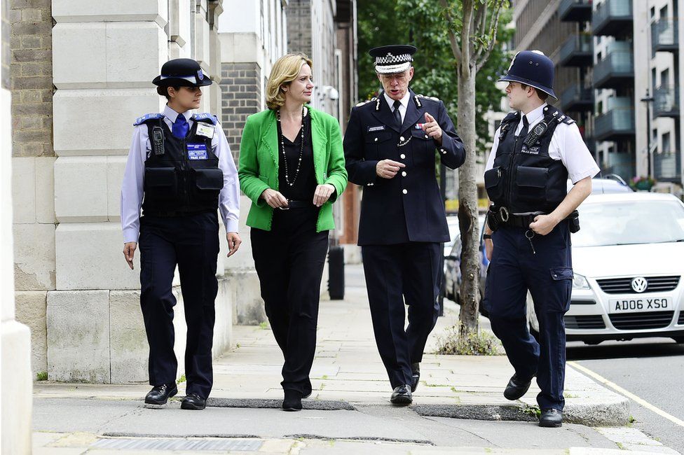 Joining a Met Police patrol with Commissioner Sir Bernard Hogan-Howe (second right)