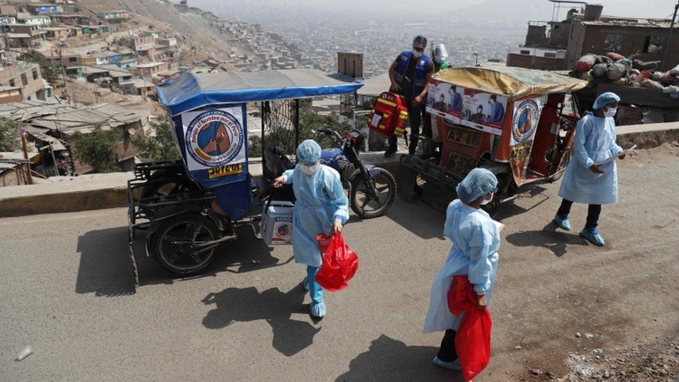 Mototaxi carrying medical personnel in a suburb of Lima - 14 May
