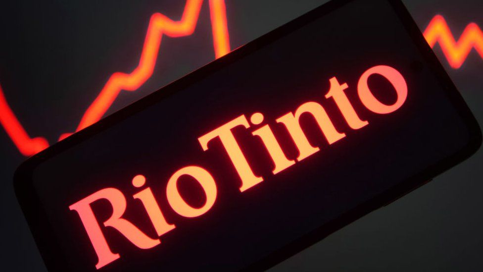 The Rio Tinto Group logo is seen on a smartphone screen