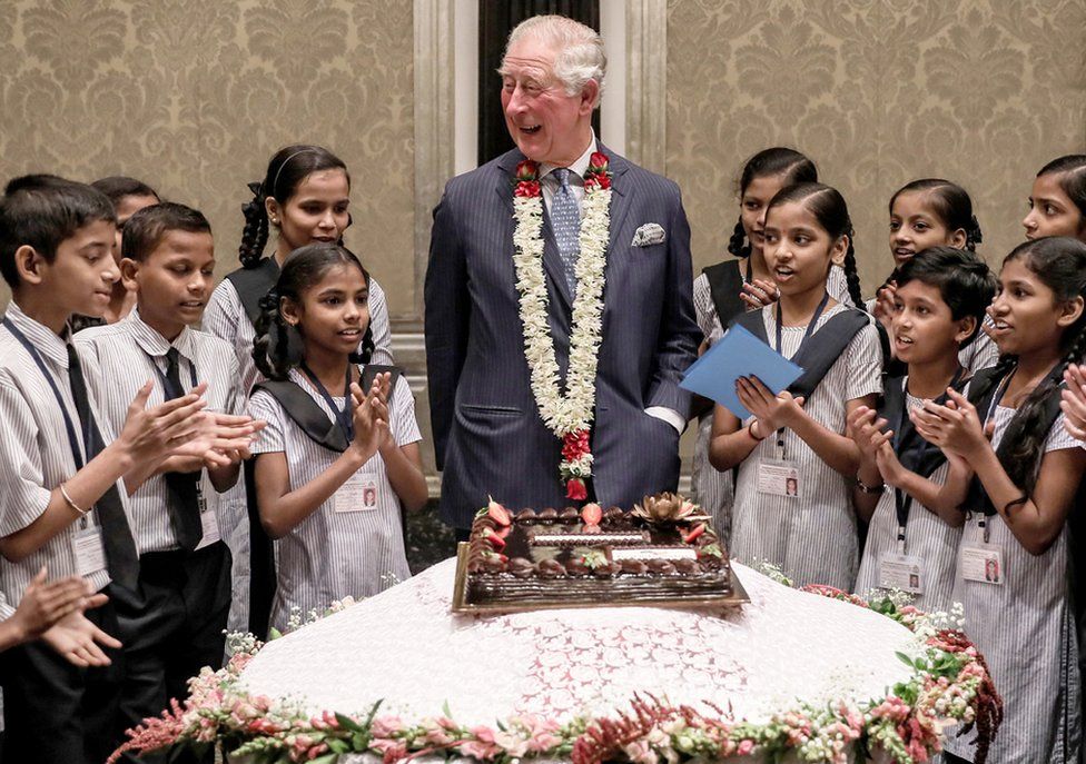 Prince Charles celebrates his birthday with schoolchildren from the Kaivalya Education Foundation during his visit to Mumbai, India.