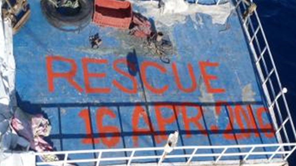 "Rescue 16 April" is written on the top of a cargo ship