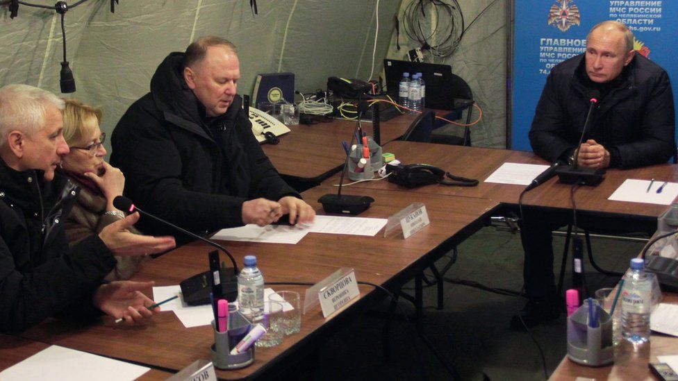 Russian President Vladimir Putin chairing a meeting in Magnitogorsk after an explosion in a block of flats