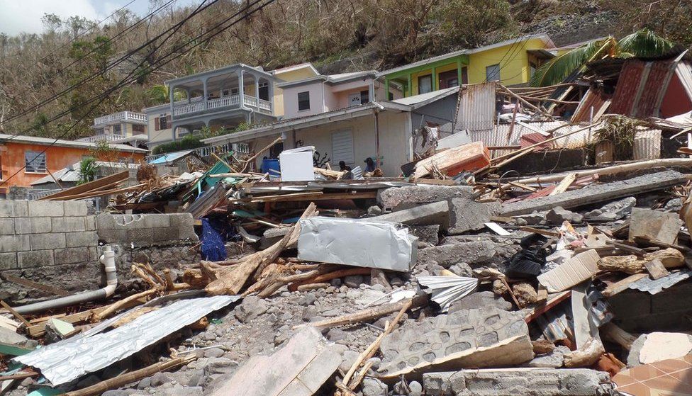 The body of Lucy Thomas, 74, is believed to be under this rubble in Scott's Head, Dominica