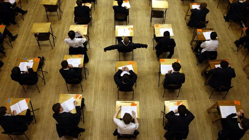 School pupils taking exams