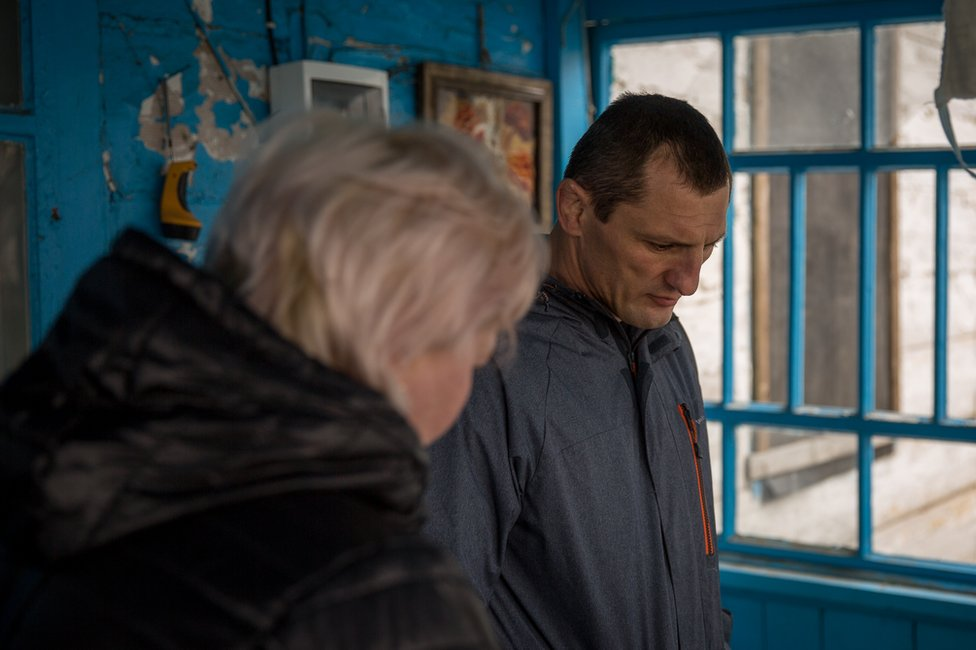 Sasha's brother Vyacheslav and his wife, at Sasha and Nikita's house in the village