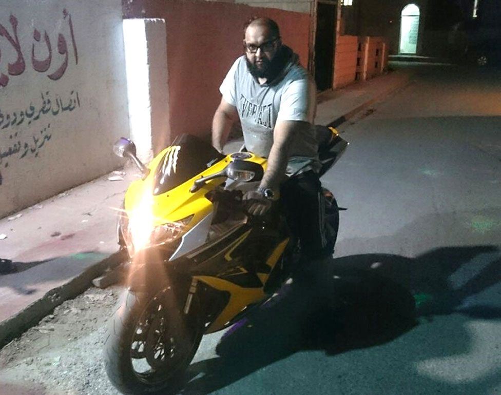 Hussain on a motorbike