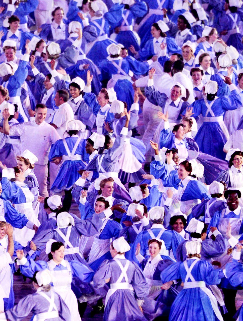 Performers pay tribute to the National Health Service during the Opening Ceremony of the London 2012 Olympic Games