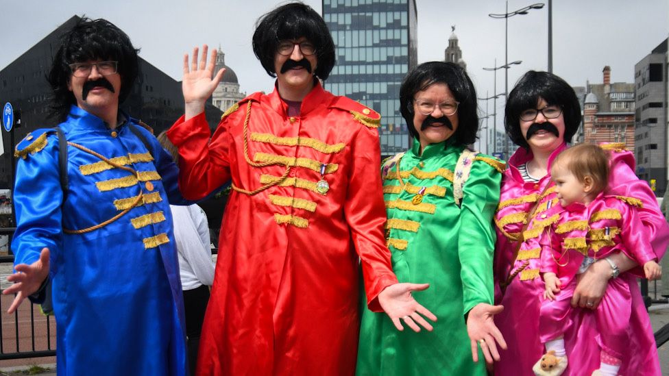 Sharp family from Liverpool in homemade Beatles Sgt Pepper-style costumes in Liverpool