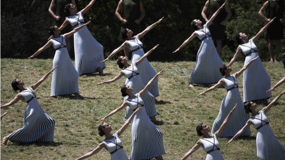 Priestesses and dancers attend the Olympic flame lighting ceremony for the Rio 2016 Olympic Games inside the ancient Olympic Stadium on the site of ancient Olympia (21 April 2016)