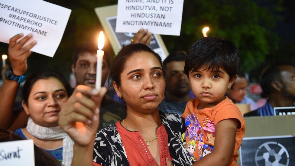 Protesters taking part in a candlelight vigil in Ahmedabad, in support of rape victims following some high profile cases.