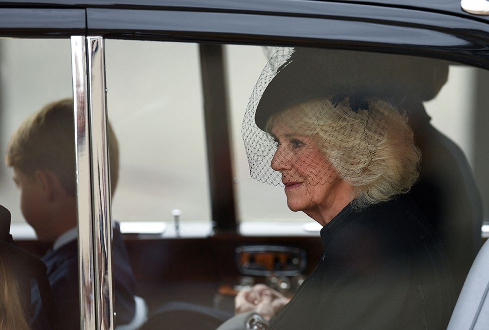 Britain's Camilla, Queen Consort, Britain's Catherine, Princess of Wales (2ndR), Britain's Prince George of Wales (2ndL) and Britain's Princess Charlotte of Wales travel down The Mall in London on September 19, 2022, ahead of the State Funeral Service of Britain's Queen Elizabeth II