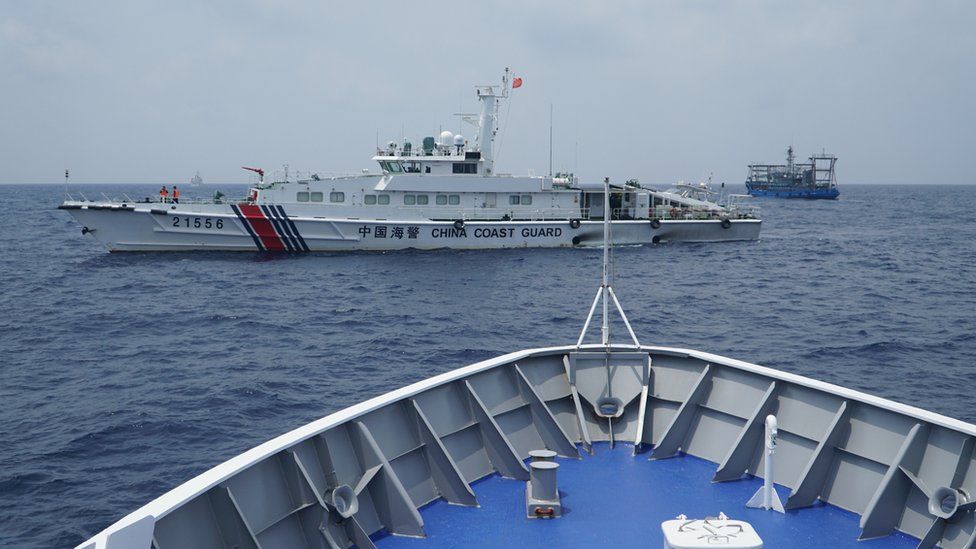 China coast guard and militia ships as seen from Philippine coast guard ship