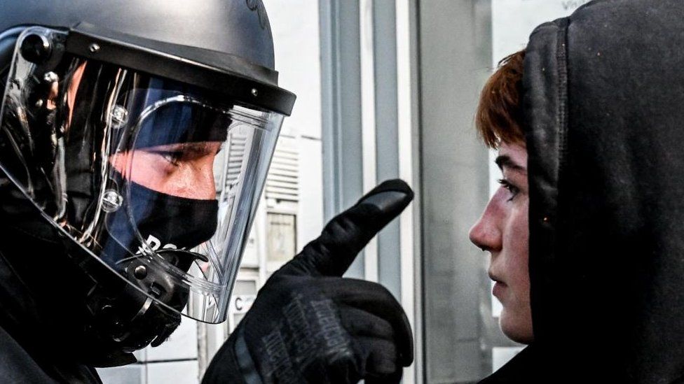A policeman argues with a participant of a left wing protest in solidarity with Lina E. in Berlin, Germany, 31 May 2023