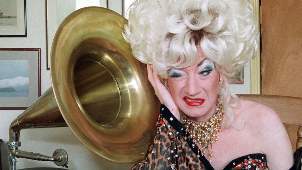 File photo dated 16/08/93 of Paul O'Grady, as Lily Savage, at home in south London