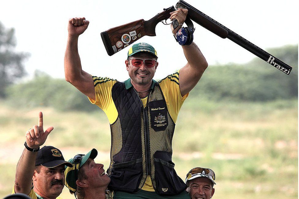 Australian shooter Michael Diamond celebrates after winning gold at the 2010 Commonwealth Games in Delhi, India