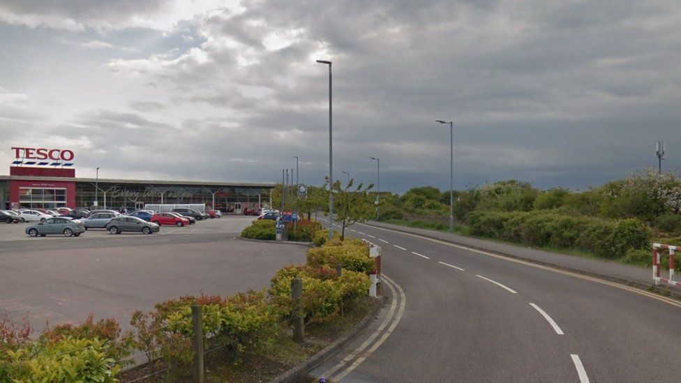 Road between Tesco and railway line