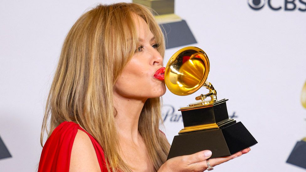 Kylie Minogue with her Grammy Award