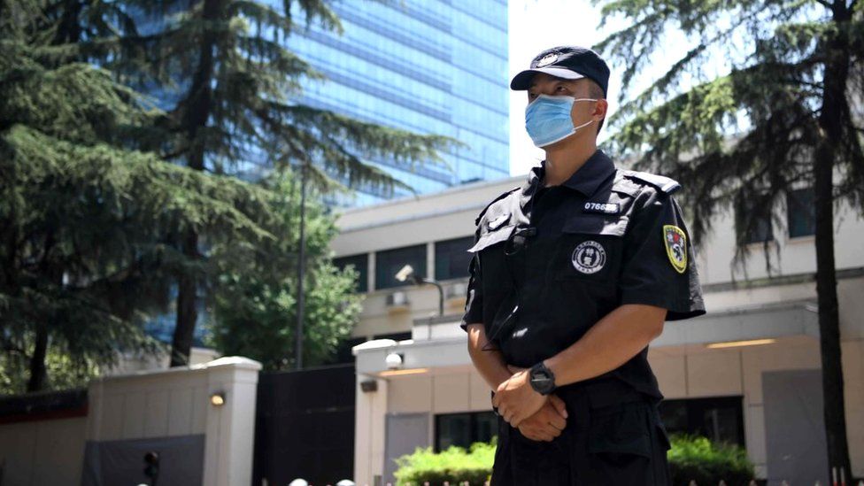 Police at Chengdu consulate