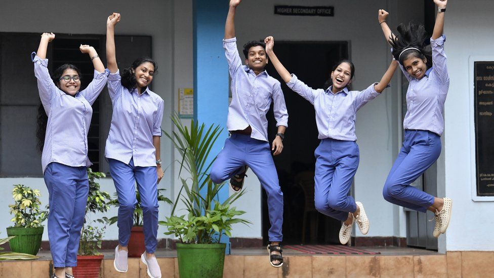 Students of Government Girls Higher Secondary School in Kerala's Balussery town in their new uniform