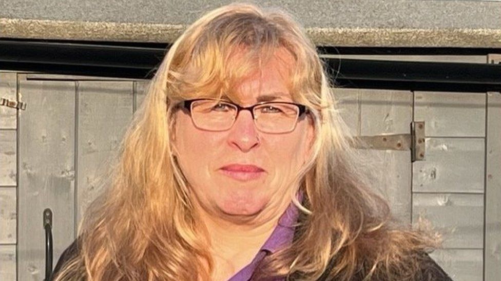 Wendy Murray pictured. She has blonde hair, is wearing glasses, a purple blouse and black cardigan.