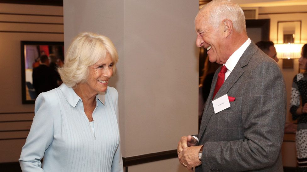 Camilla, Duchess of Cornwall greets Len Goodman at Victory Services Club on September 05, 2019 in London, England. HRH is the Patron-in-Chief of the Victory Services Association.