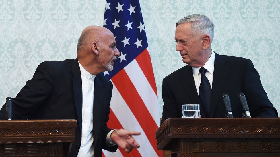 US Defense Secretary Jim Mattis (R) speaks with Afghan President Ashraf Ghani during a press conference at the Presidential Palace in Kabul on September 27, 2017