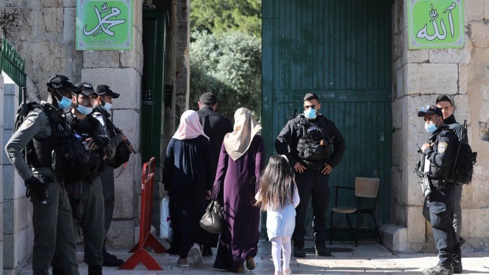 Muslim worshippers enter the Al-Aqsa Mosque compound in Jerusalem's old city