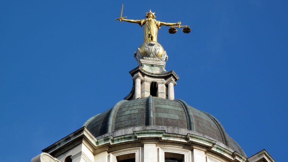 Scales of Justice of the Central Criminal Court fondly known as The Old Bailey in the city of London, England, UK