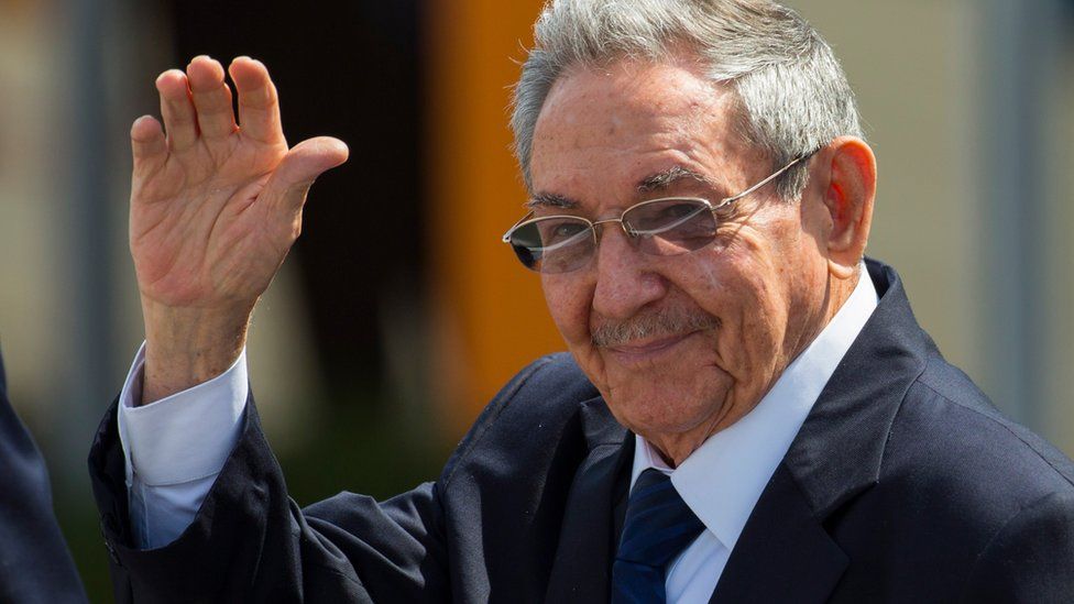 Cuba"s President Raul Castro waves to reporters from the tarmac of Jose Marti International airport in Havana, Cuba, Sunday, Feb. 14, 2016