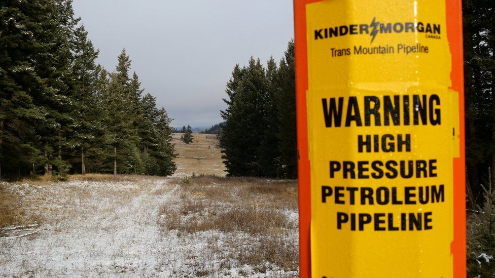 A sign warns of the presence of the Trans Mountain pipeline outside Kamloops, British Columbia