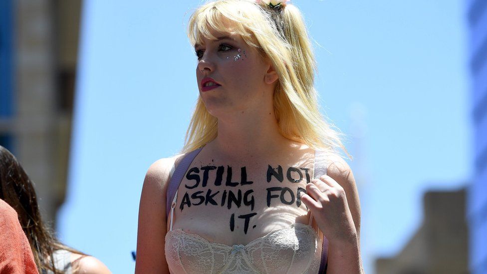 Woman in underwear with "Still not asking for it" written on her chest in Sydney - 21 January 2017