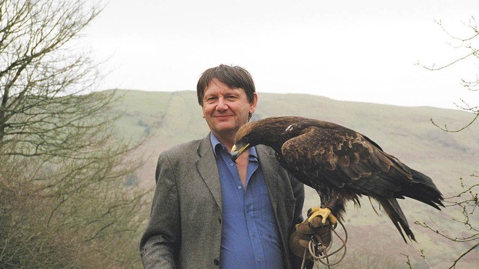 Carl Jones with an eagle