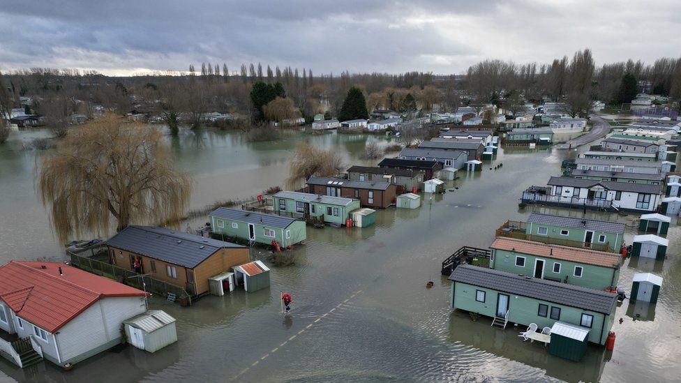 Mobile homes surrounded by water
