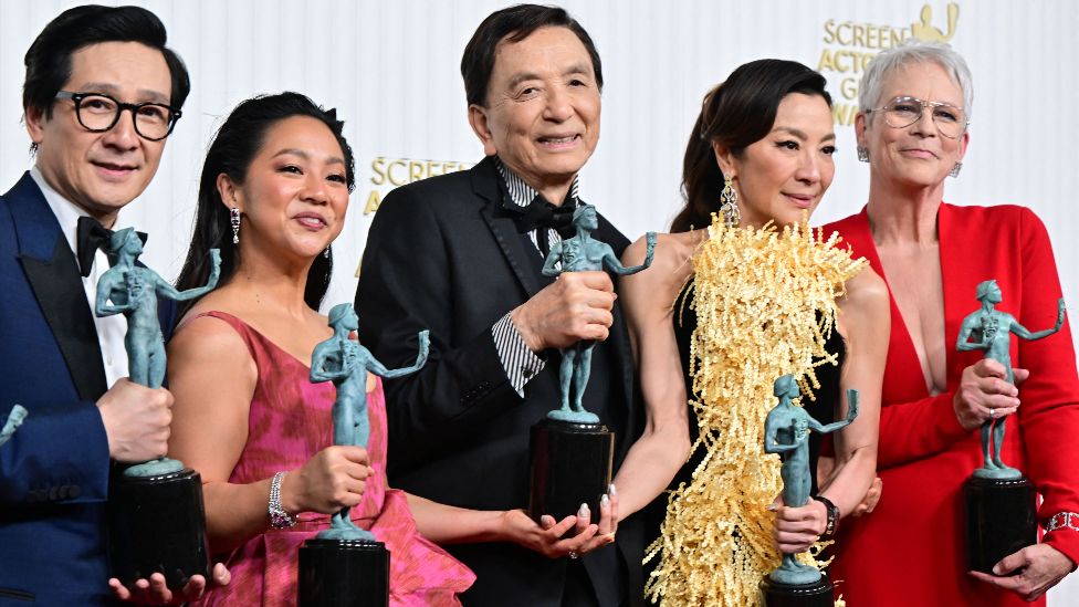 Actors Michelle Yeoh, Ke Huy Quan, Stephanie Hsu, Jamie Lee Curtis and James Hong pose with the award for Outstanding Performance by a Cast in a Motion Picture for "Everything Everywhere All at Once" during the 29th Screen Actors Guild Awards at the Fairmont Century Plaza in Century City, California, on February 26, 2023.