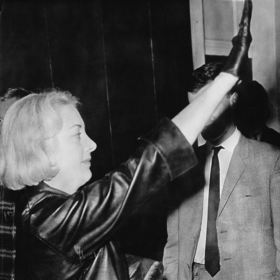 Francoise Dior gives the Nazi salute after her marriage in Coventry, in 1963