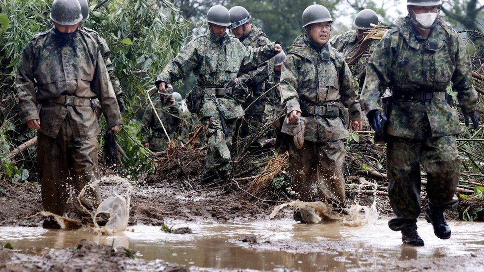 Japanese Self-Defence Force soldiers conduct search and rescue operation at a landslide site caused by Typhoon Nanmadol in Mimata Town, Miyazaki Prefecture on Japan's southernmost main island of Kyushu September 19, 2022,