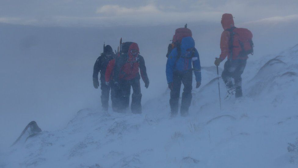 Walking party in Coire an t-Snechda