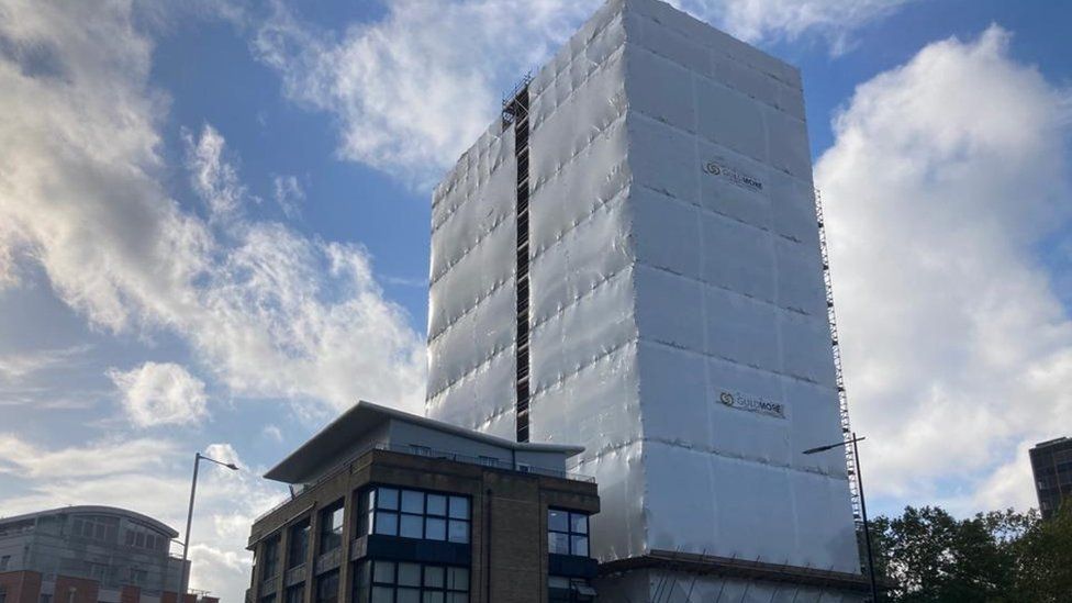 St Francis Tower, Ipswich wrapped in protective plastic and scaffolding