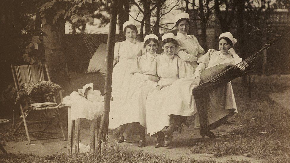 Nurses at the hospital relaxing, date unknown