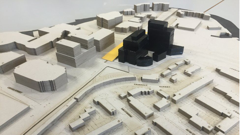 A model of the office blocks shows their scale